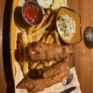 a plate of fried fish and fries