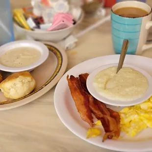 a plate of breakfast food and a cup of coffee