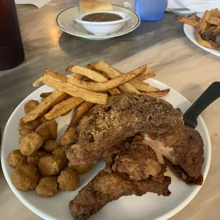 Ain't nothing better than fried pork chops with gravy and a side of okra. Let's eat!