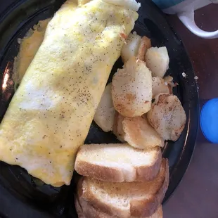 Western omelet, fried potato's , sour dough bread toast.