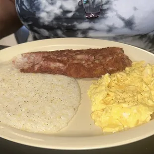 Corned Beef Hash soft scrambled eggs and grits.