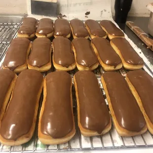chocolate frosted donuts on a cooling rack