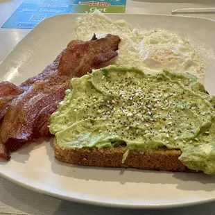 Avocado toast, 2 eggs over easy w a side of bacon