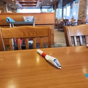 a fork on a table in a restaurant