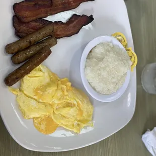 Two meat classic combo with sausage links, bacon, eggs scrambled with American cheese, side of grits, and biscuits and gravy (not pictured)