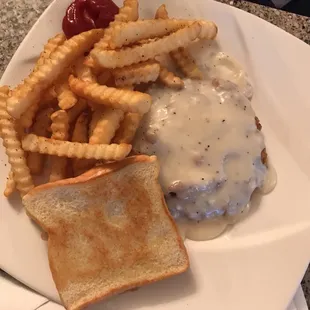 Chicken fried steak with fries