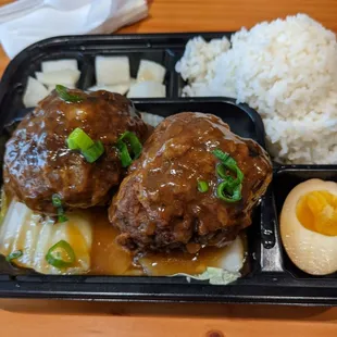 Braised "Lion's Head" Meatball Rice Box with pickled radish,  soy sauce egg, and soup. 10.95 with cash. Good value