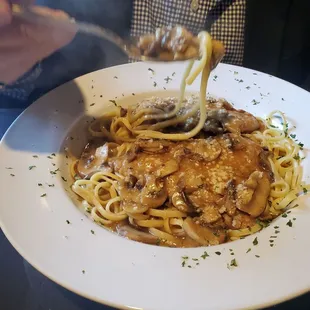 Veal Marsala,  excellent,  served over linguine