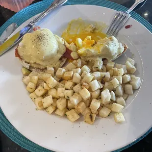 Eggs Benedict with breakfast potatoes