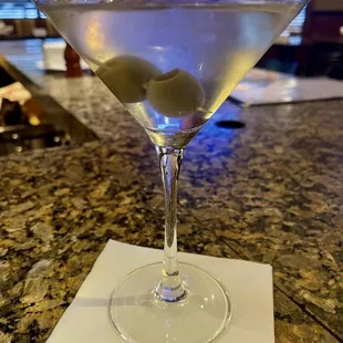 a martini with olives