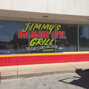 a car parked in front of the restaurant