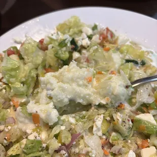 Greek salad specially chopped with Greek potato salad. Now it's on my last meal list, it's that good!