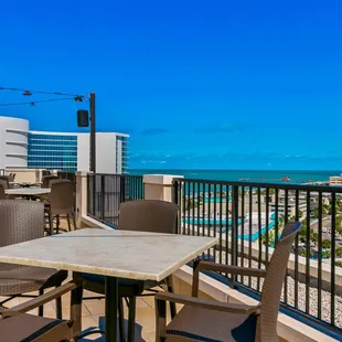 a balcony overlooking the ocean
