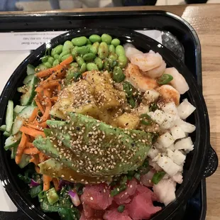 Poke Bowl with Tuna, Yellowtail, Shrimp and brown rice.