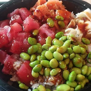 My large poké bowl with some edamame and ginger.....wait where did the leak come from? It's in the bottom right corner