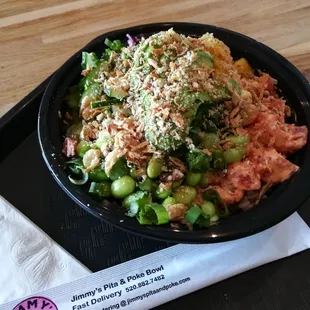 Snack size poke bowl with spicy tuna and brown rice