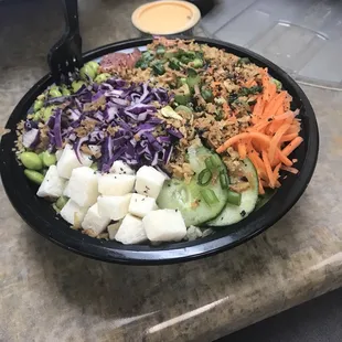 Poke bowl with Ahi Tuna and Salmon. So good!