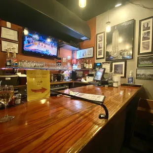 a bar with a wooden bar top