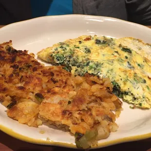 Spinach omelet and home fries.