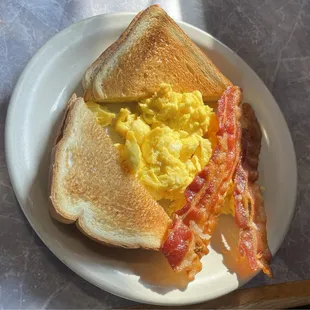 2 Eggs with Toast and 1 Egg, Toast, &amp; 2 Pieces of Bacon or Sausage