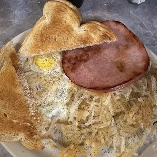 2 Eggs with Toast, Ham and hash browns