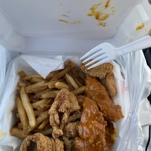 Honey gold dipped Chicken Tenders, Fried Catfish, Fries
