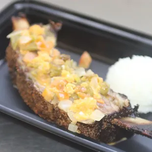 a grilled fish and mashed potatoes