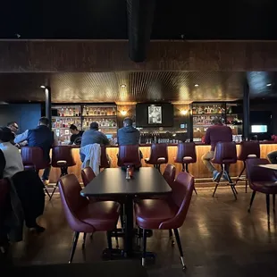 people sitting at the bar