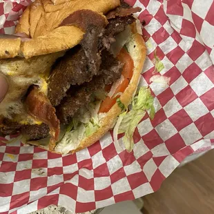 Double cheeseburger with grilled onions and bacon it doesn't look appealing cause this was after a walk