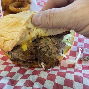 Showing how think the beef patty's are.