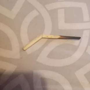 a wooden stick laying on the floor