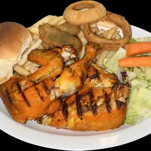 Pollo Asado Dinner Plate - Grilled Chicken with Fries, 2pc Zucchini 2pc Onion rings and a side salad and dinner roll.