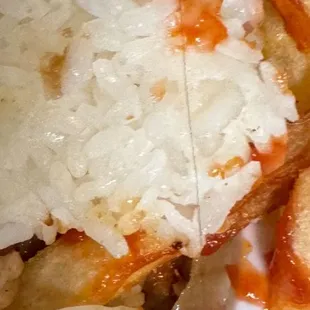 Chicken Teriyaki platter that was ordered, with the hair that was found.