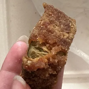 Black,soft,old, rancid, mold smelling zucchini