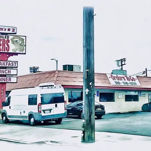 a van parked in front of a restaurant
