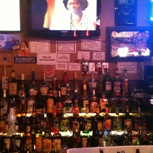 a bar full of liquor bottles