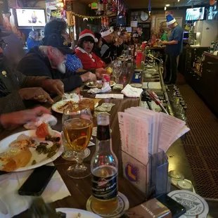 people sitting at the bar
