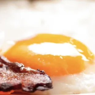 bacon and eggs on a plate