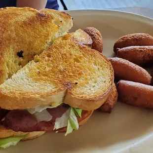 Club sandwich with hush puppies