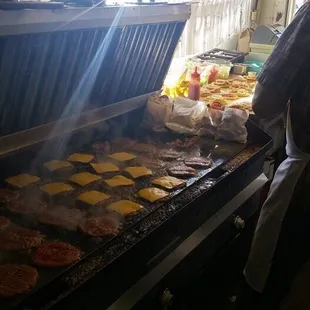 Hot burgers getting freshly cooked!