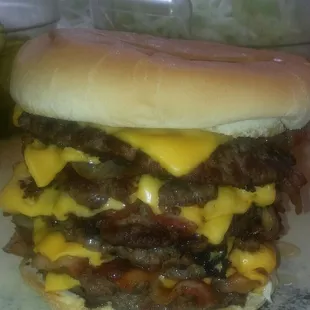 A juicy 6 meat, 6 cheese beast of a burger, very tasty!