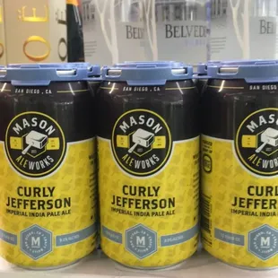 a row of cans of jim's