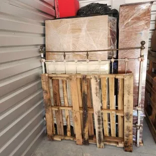 Storage Unit: Expertly wrapped and stacked for maximum protection. We can provide pallets for moisture control as well!