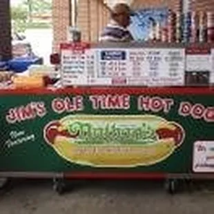 a man selling hot dogs