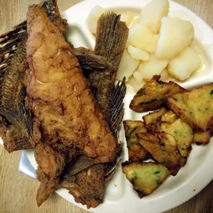 Black bass, veggie fritters and boiled tators