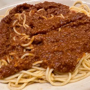 Medium plate with meat sauce.