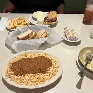 Medium spaghetti with meat sauce, salad with house oil &amp; vinegar, haddock sandwich.