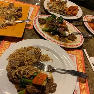 Beef chow mein, broccoli beef, and orange chicken