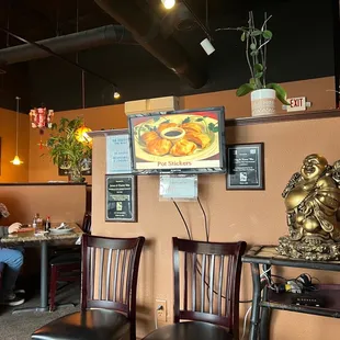 a man sitting at a table in a restaurant