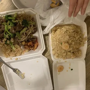 two take out containers of food